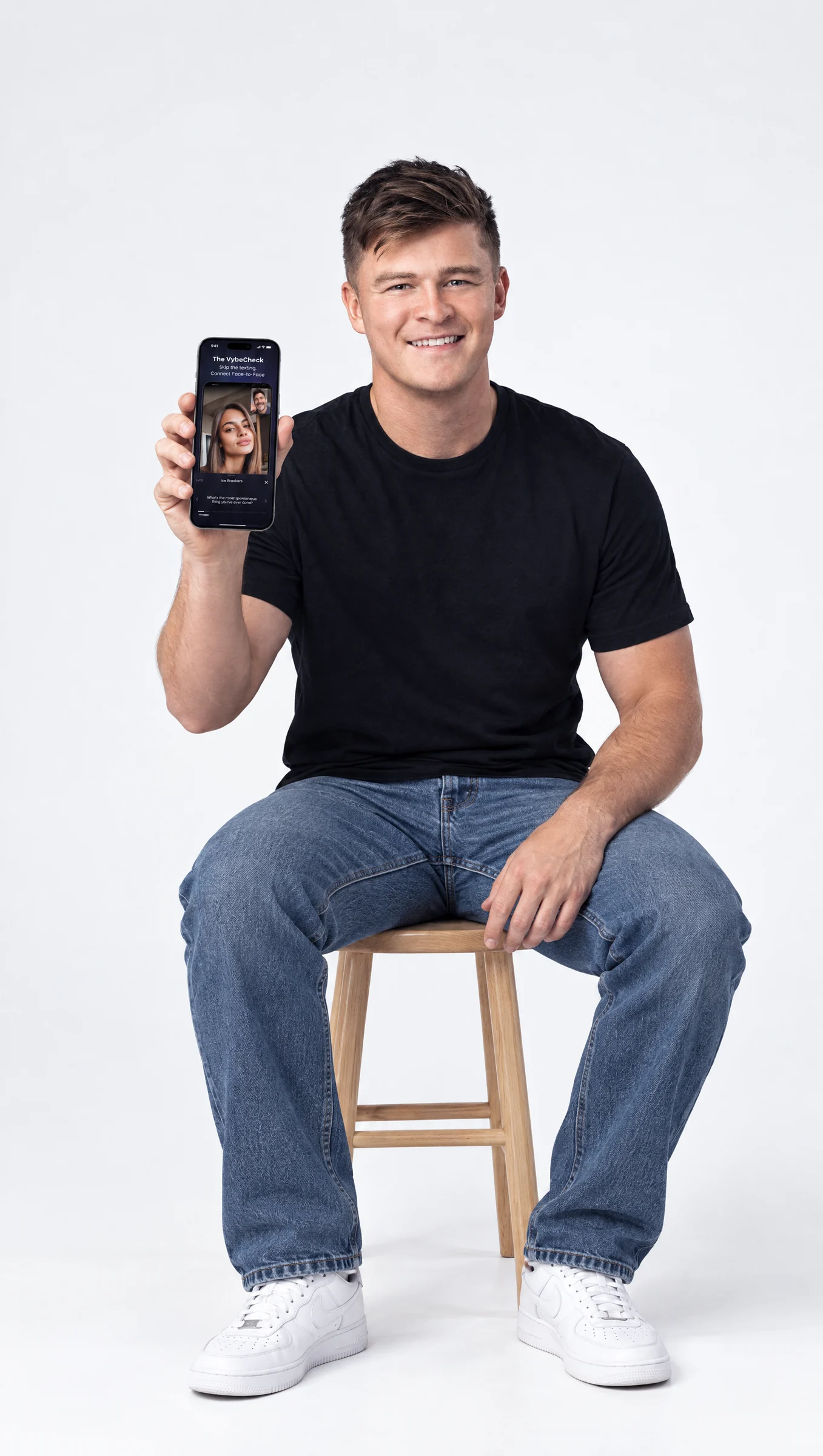 Vybes founder holding the app